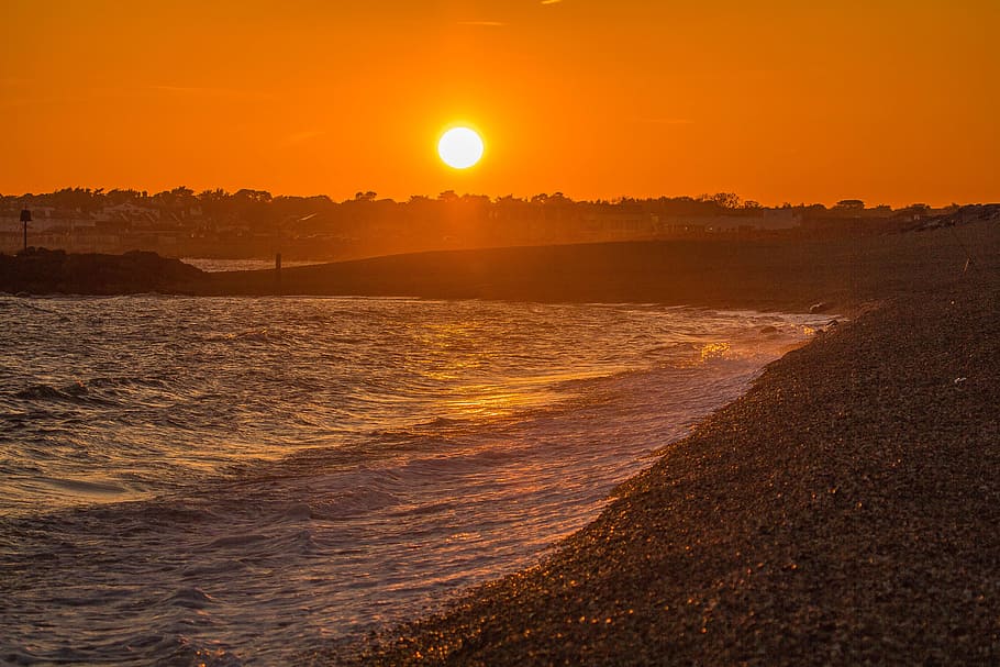 photo of seashore under golden sky, sunset, coast, ocean, england HD wallpaper
