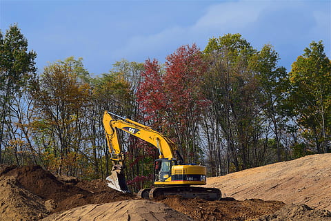 yellow front loader near green leaf trees at daytime, construction HD wallpaper