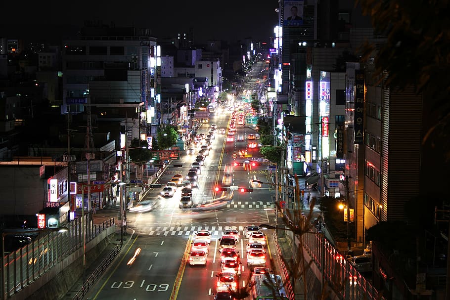 aerial photography of city intersection with buildings and heavy traffic at night, HD wallpaper