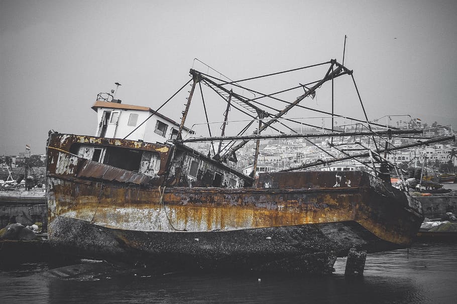 brown and white wreck boat during daytime, ship, sea, old, water