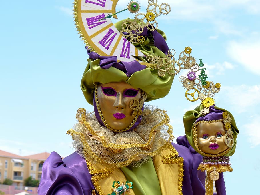 person wearing mask under sunny sky, masks of venice, carnival of venice