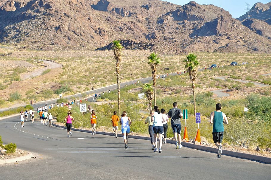 group of people running on road near mountain, runners, triathlon HD wallpaper
