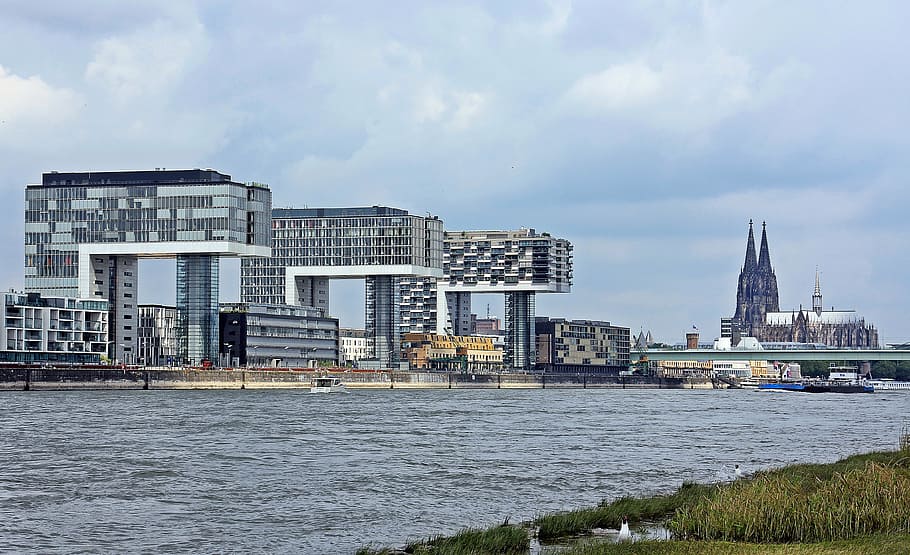 concrete structures near body of water, crane homes, architecture HD wallpaper