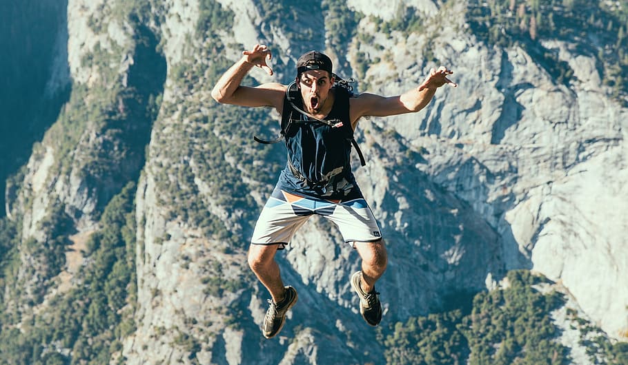 man jumping in front of mountain, people, guy, roar, travel HD wallpaper