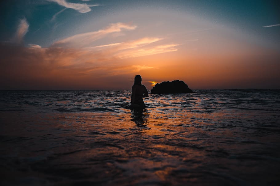 Silhouette of Woman On Ocean During Sunset, afterglow, backlit HD wallpaper