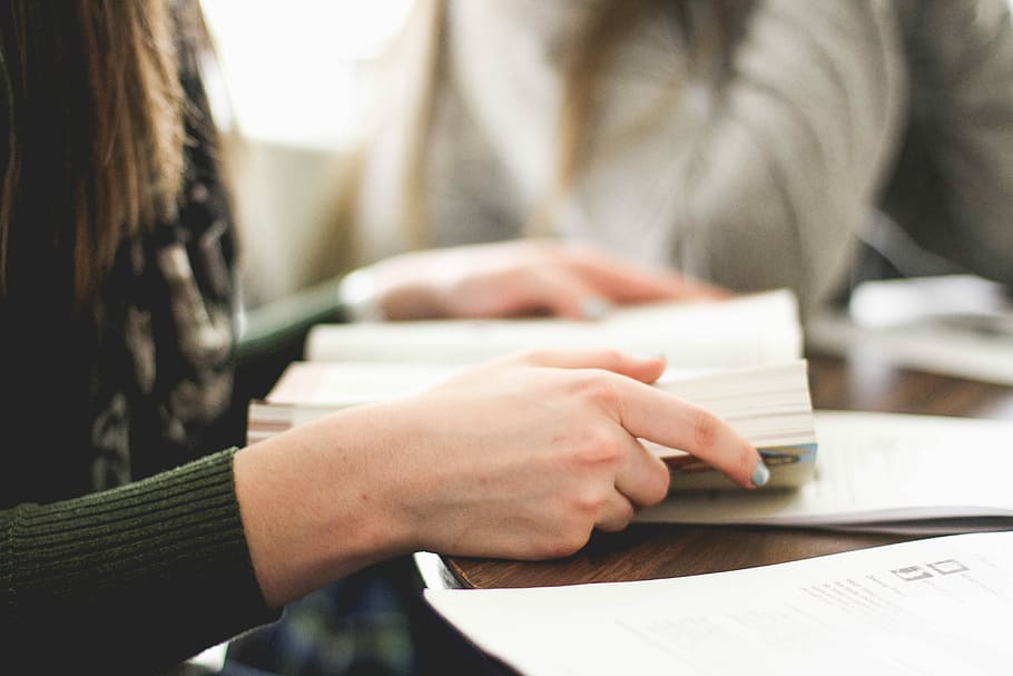 woman sitting on chair in front of table white reading book, woman reading book sitting on chair HD wallpaper