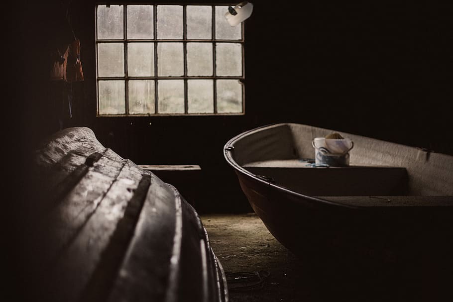 two brown boats near window, dinghy boat inside shed, workshop HD wallpaper