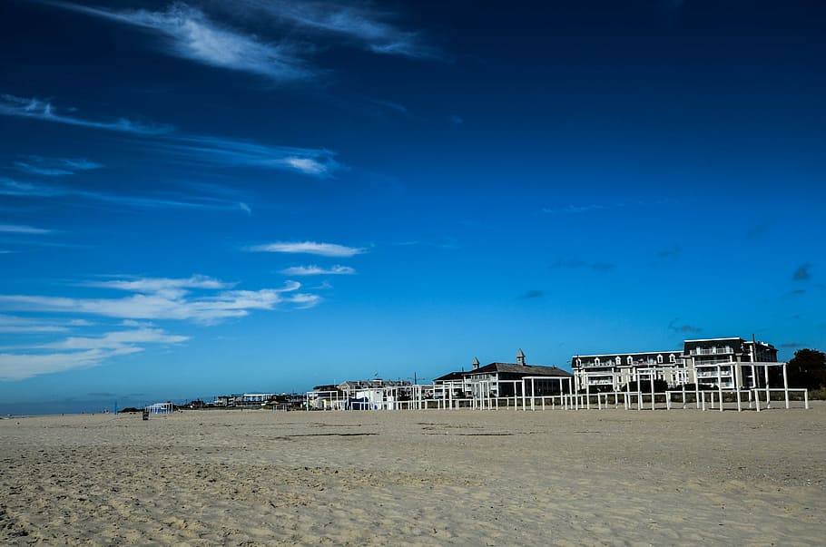 sand, sky, town, beach, land, cloud - sky, blue, architecture HD wallpaper