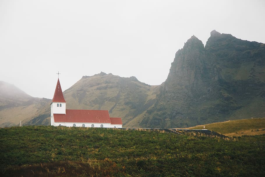 red and white church near mountain, rural, fog, hilltop, overcast