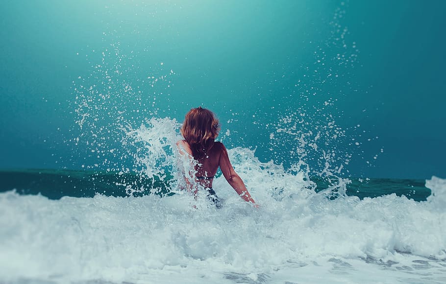 HD wallpaper: woman sitting on seashore, woman on water wave, spray, splash  | Wallpaper Flare