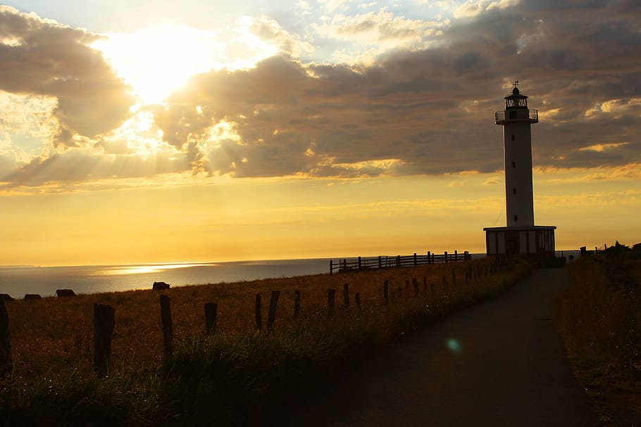 sea, lighthouse, sunset, costa, landscape, sky, cloud - sky HD wallpaper