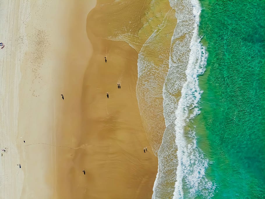aerial photo of calm body of water, aerial photography of people on beach HD wallpaper