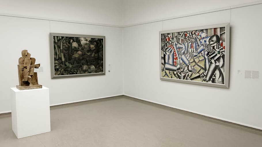 two abstract painting hang on corner of wall, kröller-müller