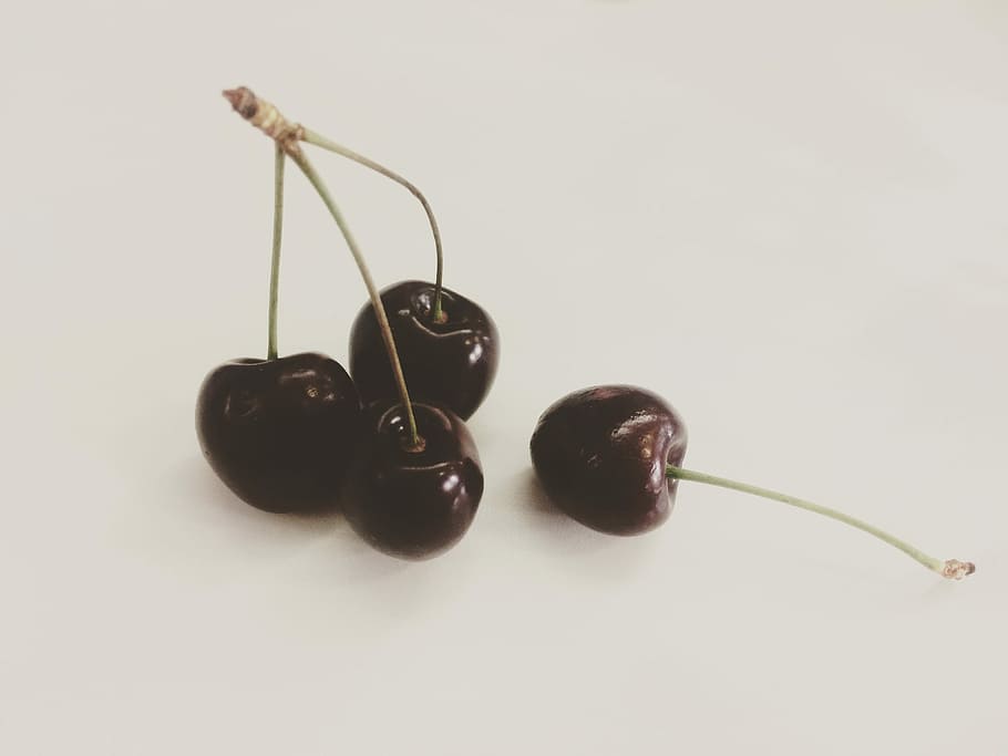 Cherries, cherries on white surface, cherry, fruit, stalk, stem HD wallpaper