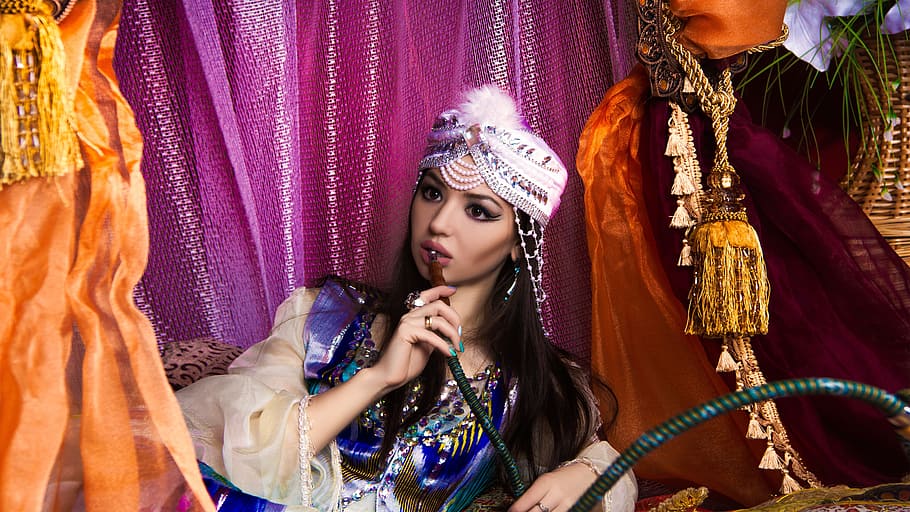 woman in blue and white dress using hookah, girl and hookah, eastern girl