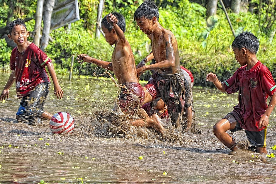 five boys playing at the mud, ball, child, jogjakarta, yogyakarta