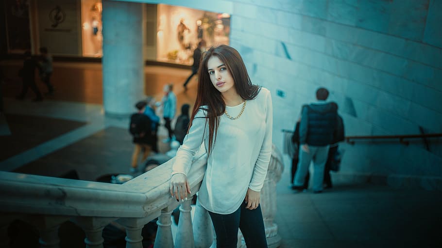 woman in white long-sleeved shirt leaning on concrete stair handrail HD wallpaper
