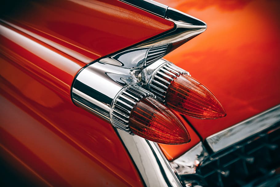 shallow focus photography of red tail light, car, chrome, classic