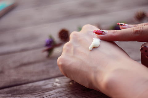person putting lotion on arm knuckl, human Hand, women, close-up HD wallpaper