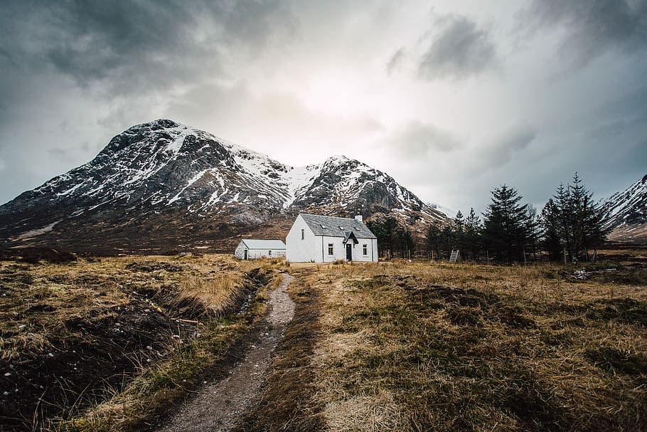 white and gray house during daytime, white and black 1-storey house near mountains under nimbus clouds HD wallpaper