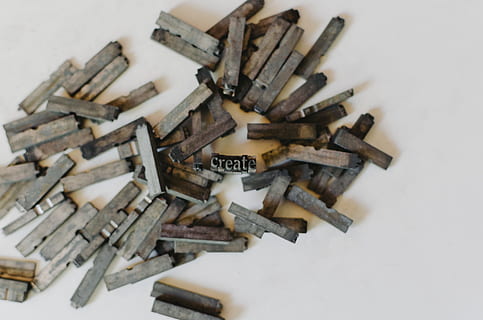 closeup photo of clothespin lot on white surface, Printing Press Letters HD wallpaper