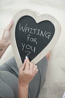 person writing a waiting for you in heart-shaped board, pregnancy HD wallpaper
