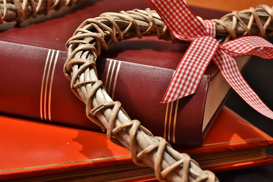red hardbound book on table, gift, read, packaging, heart, love HD wallpaper