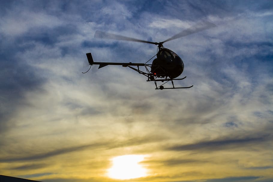 helicopter, against light, sky, clouds, eventide, fly, cloud - sky HD wallpaper