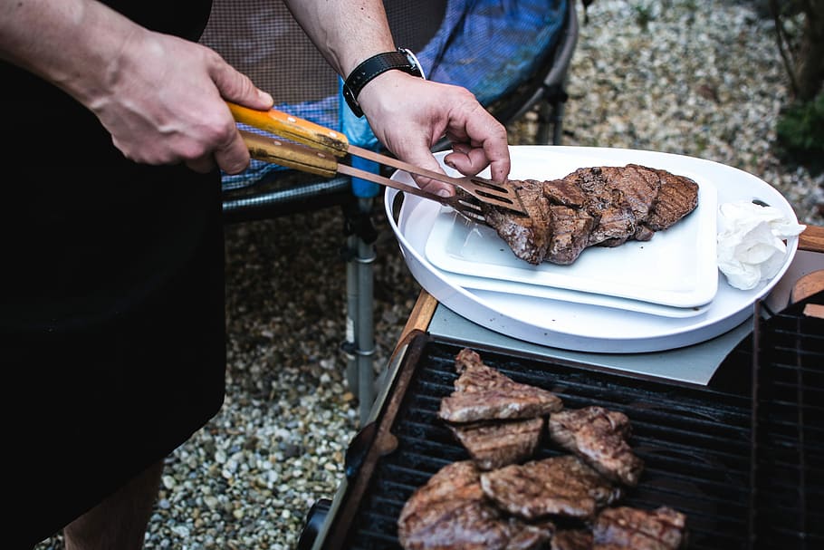 Beef steaks barbeque, cooking, grilling, hands, meat, outside HD wallpaper