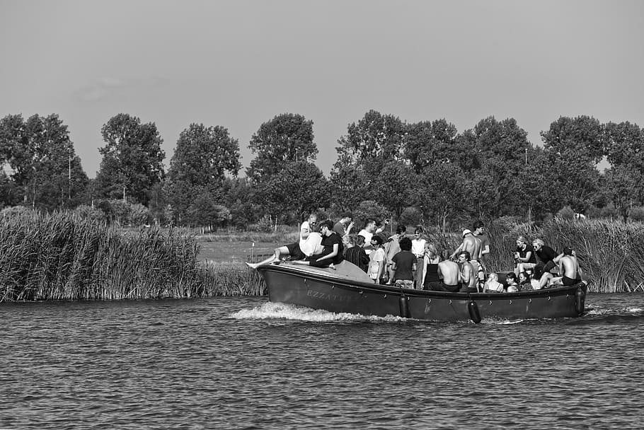 grayscale photography of people riding boat on body of water HD wallpaper