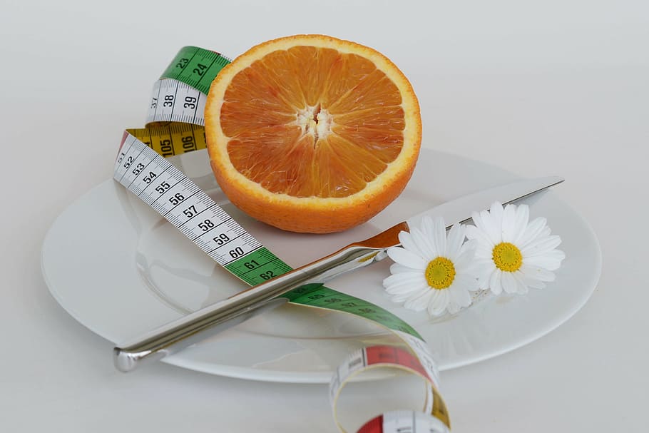 slice orange fruit on white ceramic plate, remove, nutrition HD wallpaper
