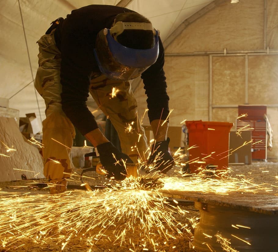 man holding welding rod wearing blue welding helmet, working HD wallpaper