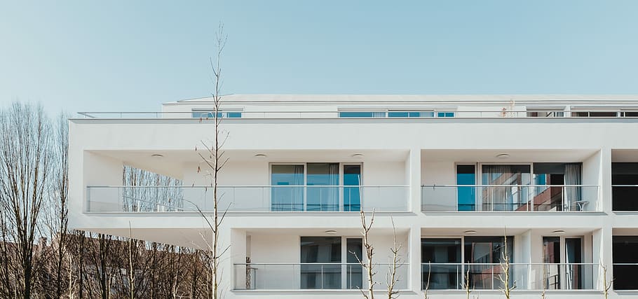 white painted building under blue sky, white concrete building HD wallpaper