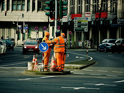 three men standing in the middle of road, workers, road workers HD wallpaper