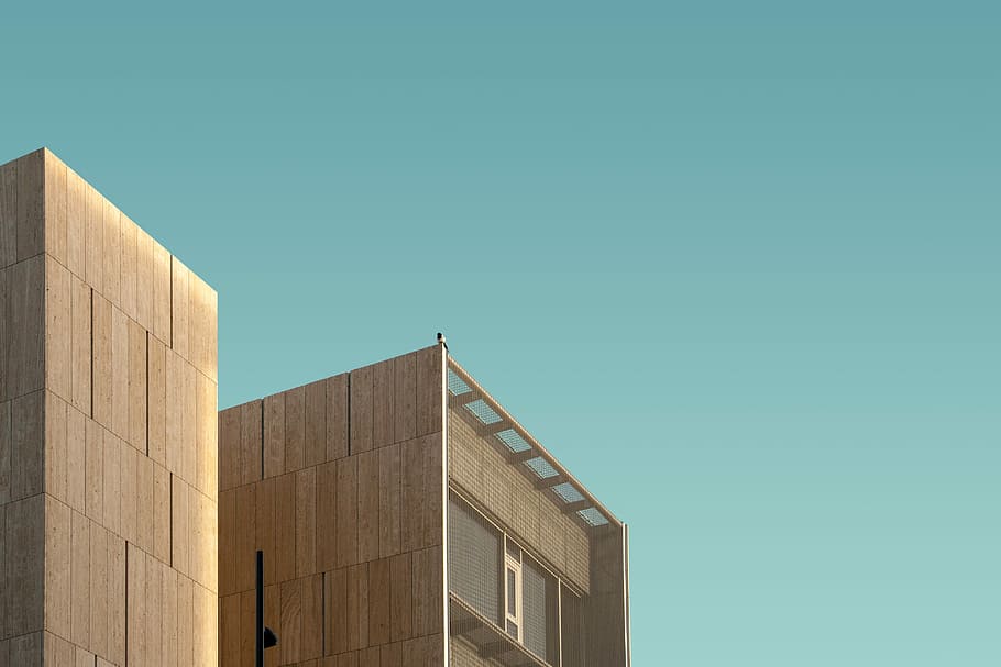 brown high-rise building under clear sky during daytime, high rise photo of brown building at daytime HD wallpaper
