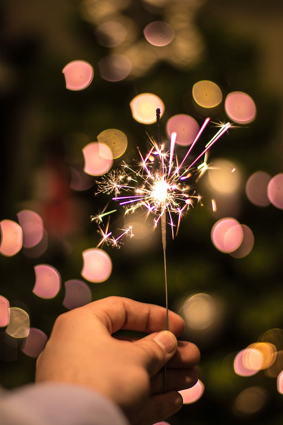Hd Wallpaper Bokeh Photography Of Person Holding Fireworks Person Holding Fire Cracker Wallpaper Flare