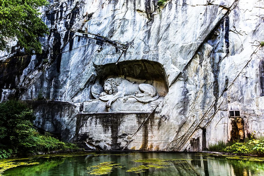 lion statue on white wall, swiss, lucerne, empty of lion, solid