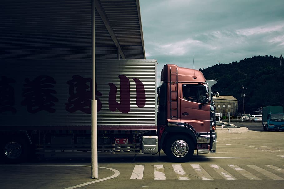 red and grey truck on road, lorry, transportation, logistics