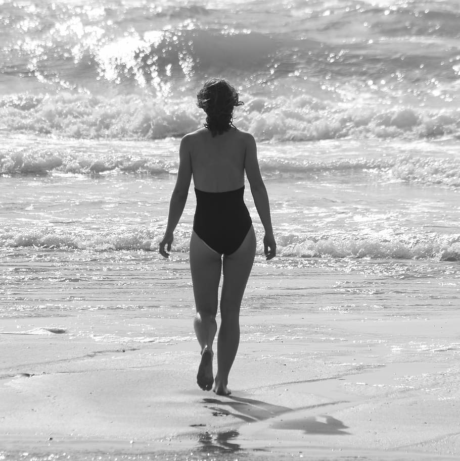 grayscale photography of woman in one piece swimsuit, sea, ocean