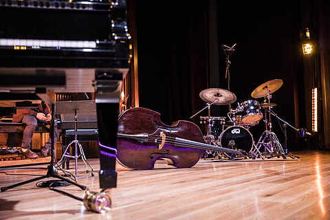low angle photography of violin on ground, brown cello on floor HD wallpaper