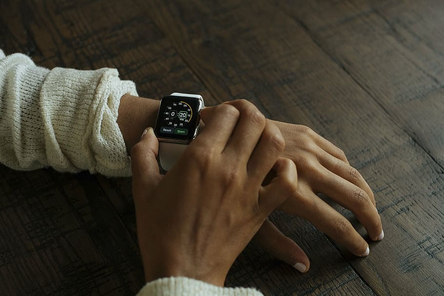 person adjusting smartwatch, people, hands, wrist, time, clock, HD wallpaper