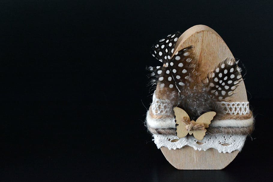 brown and black egg decor, easter egg, wood, feather, easter decoration HD wallpaper