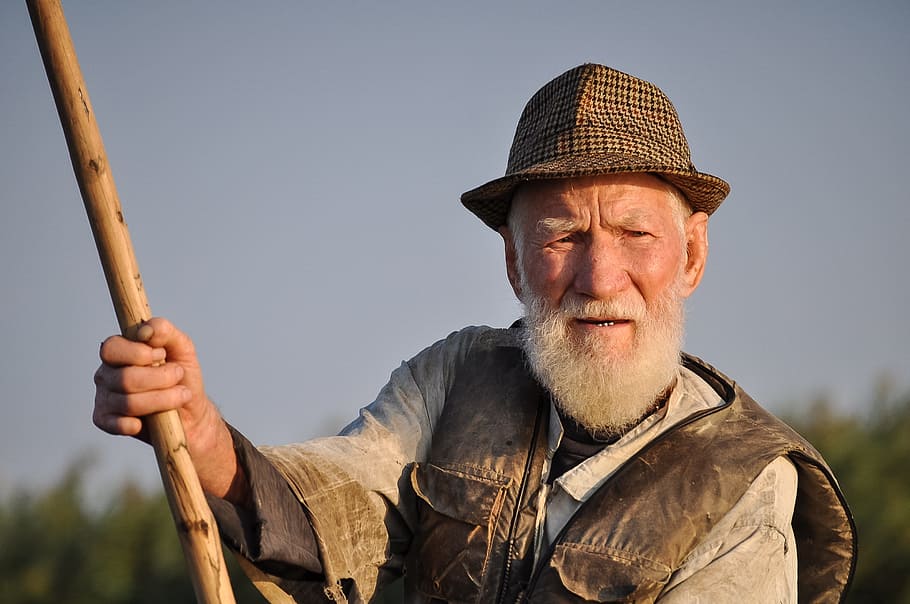 Man Wearing Hat Holding Wooden Rod Under Gray Sky, activity, beard HD wallpaper