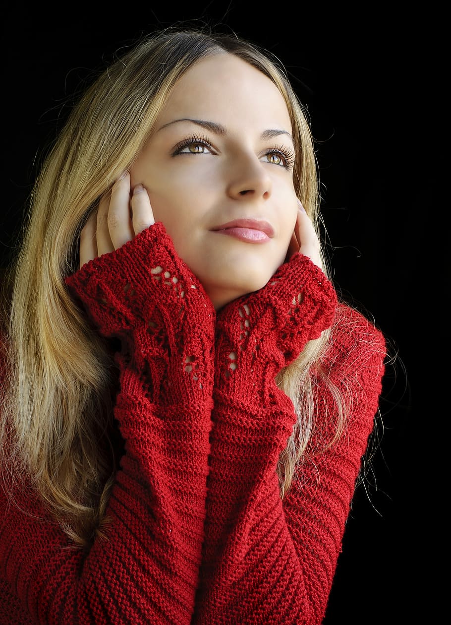 selective focus photography of woman in red knitted sweater, fashion