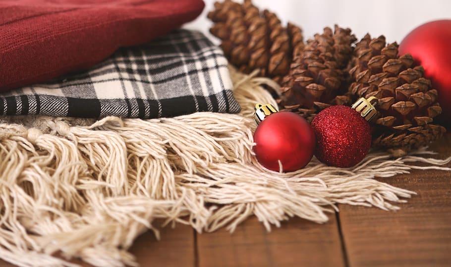 two red baubles beside acorn, winter, christmas, flatlay, pine cone HD wallpaper