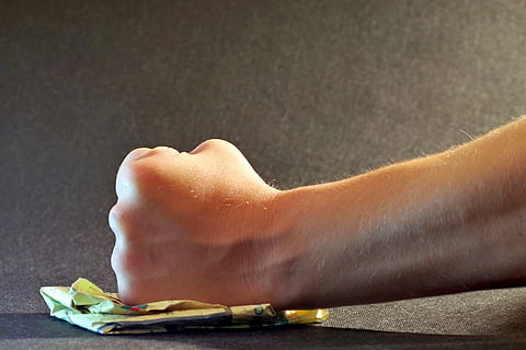 person's fist on yellow paper, anger, impotence, oppression HD wallpaper
