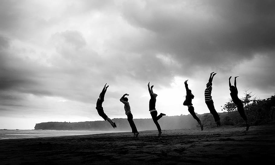 grayscale photography of six people jumping at sand nearby body of water, HD wallpaper