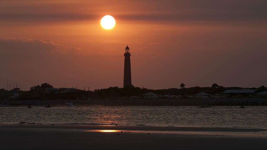 lighthouse, sunset, beach, sea, ocean, coast, sky, travel, water HD wallpaper