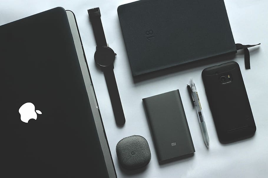 black MacBook, watch, smartphone and notebook, closeup photo of laptop and phone on white surface, HD wallpaper