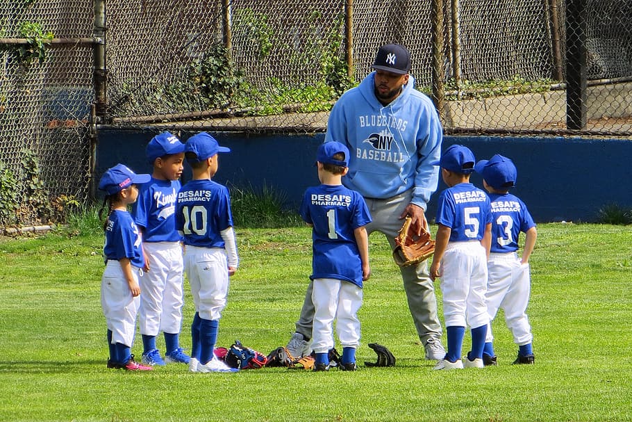 six boy gather with coach on baseball field, team, little league